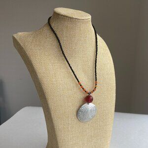 Black & Orange Beaded Necklace with Silver Medallion